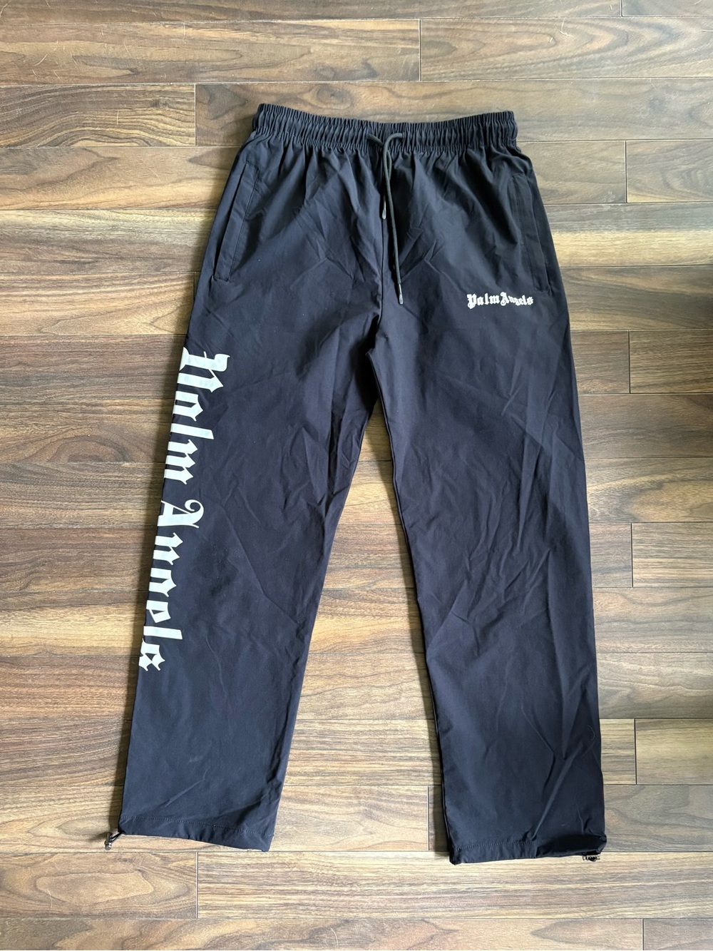 Palm Angels Black Elastic Waist Track Pants with White Logo Tag